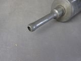 a metal object that is laying on the floor