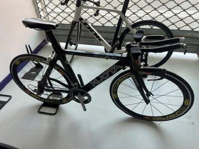 a bike that is sitting on a table in a room