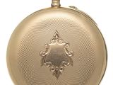 an image of a gold pocket watch on a white background