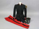 an image of a uniform and boots on a mannequin