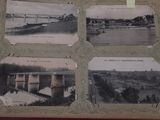 an old photo of a book with pictures of a bridge and a river