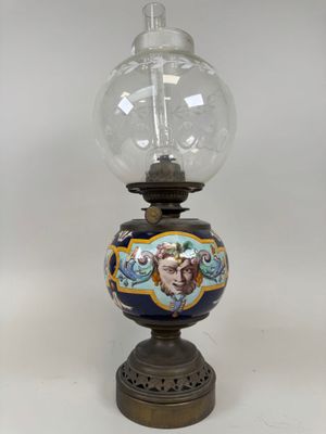 a lamp that has a picture of a woman on it