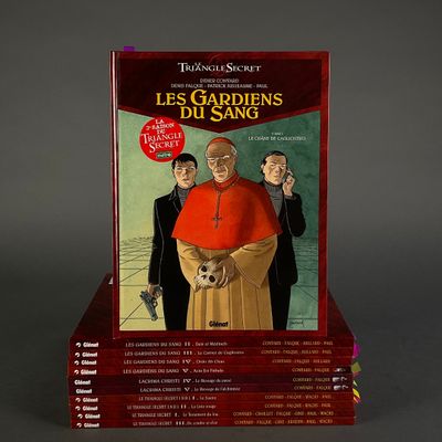 a red book with a picture of a man in a priest ' s robes