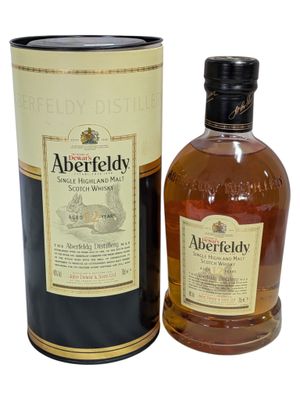 an image of a bottle of aberfieldy whisky next to a canister