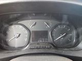 a close up of a car dashboard with a speedometer and gauges