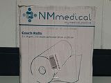 packaging of a medical device sitting on a table in front of a white wall