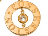 gold plated necklace with a diamond and chain on a white background