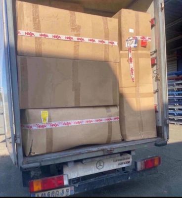 a truck that has a lot of boxes in the back