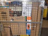 a cart with a lot of boxes on it in a warehouse