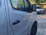 a white van parked on the side of the road