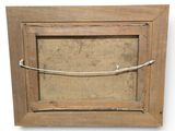 an old wooden frame with a rope hanging from it