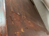 a close up of a piece of wood on a table