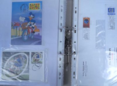 a binder with a picture of mickey mouse on it
