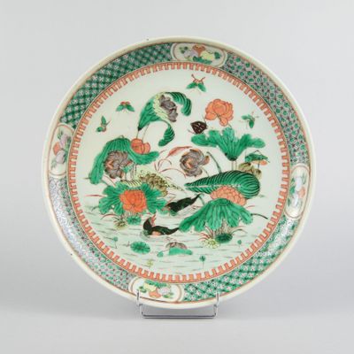an image of a plate with a design of birds and flowers on it