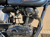 a motorcycle that is parked on the side of the road