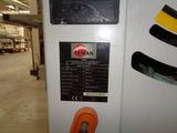 a picture of a machine that is sitting in a warehouse