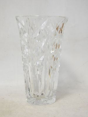 a glass vase that is sitting on a table
