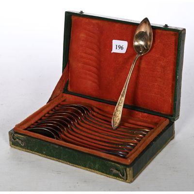 a box with a spoon and spoons inside of it