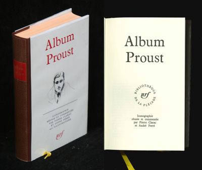 two books sitting next to each other on a table
