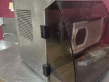 a microwave sitting on a counter in a kitchen