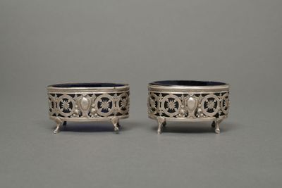 pair of silverplated bowls with handles and handles