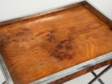a wooden tray with a metal frame on it