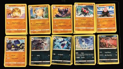pokemon trading card game set with a lot of cards on the table