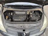 the engine of a car with its hood open and the hood open