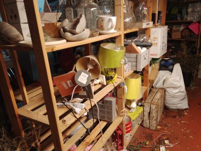 many items on the shelves in the room