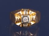 l'image d'une bague en or sertie d'un diamant