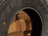 tires are stacked on top of each other in a room