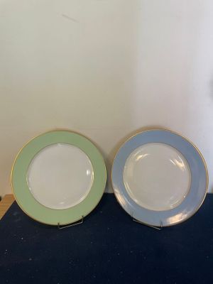 two plates that are sitting on a table