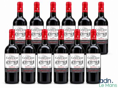 a group of bottles of red wine sitting next to each other