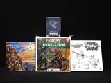trois livres posés sur une table
