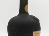 a bottle of wine that is sitting on a table
