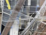 a pile of items wrapped in plastic on a pallet