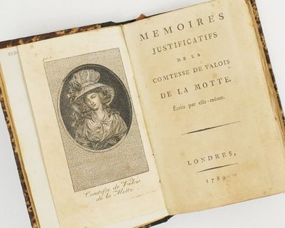 an old book with a picture of a man in a hat on it