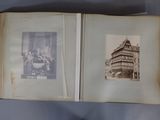 two old photos of a building on the inside of an open book