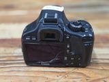 a camera that is sitting on a wooden table