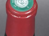 a close up of a bottle of wine on a table