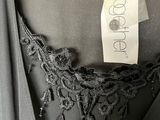 a close up of a dress with a label on it
