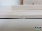 a white box with a sticker on it sitting on a table