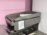 a stove that has a bunch of pans in it