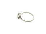 an image of a silver ring with a diamond on it
