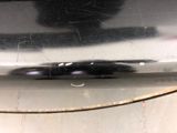 a close up of a car ' s rear end with a mirror on it