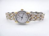 an image of a woman ' s wrist watch on a white surface