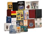a lot of books that are sitting on a table