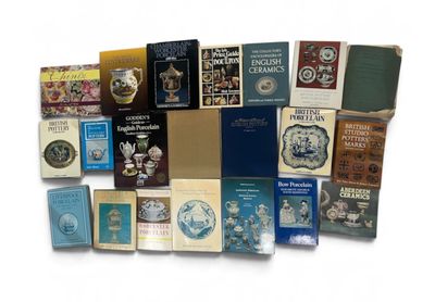 a lot of books that are sitting on a table