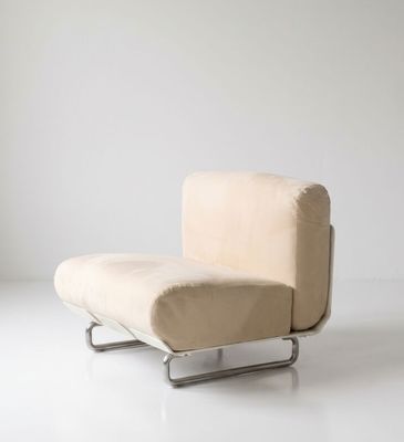 an image of a chair that is sitting on a white floor