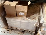 a pile of boxes sitting on top of a pile of cardboard